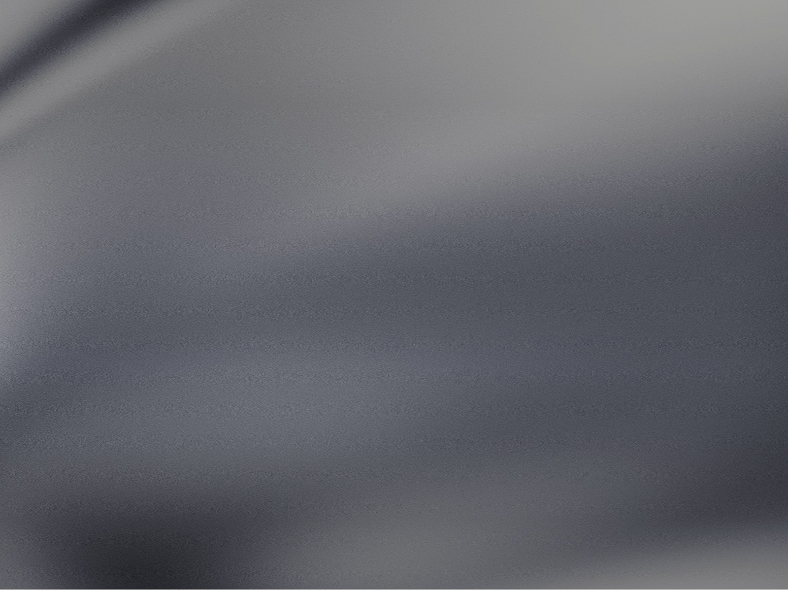 Abstract gray texture with soft gradients.