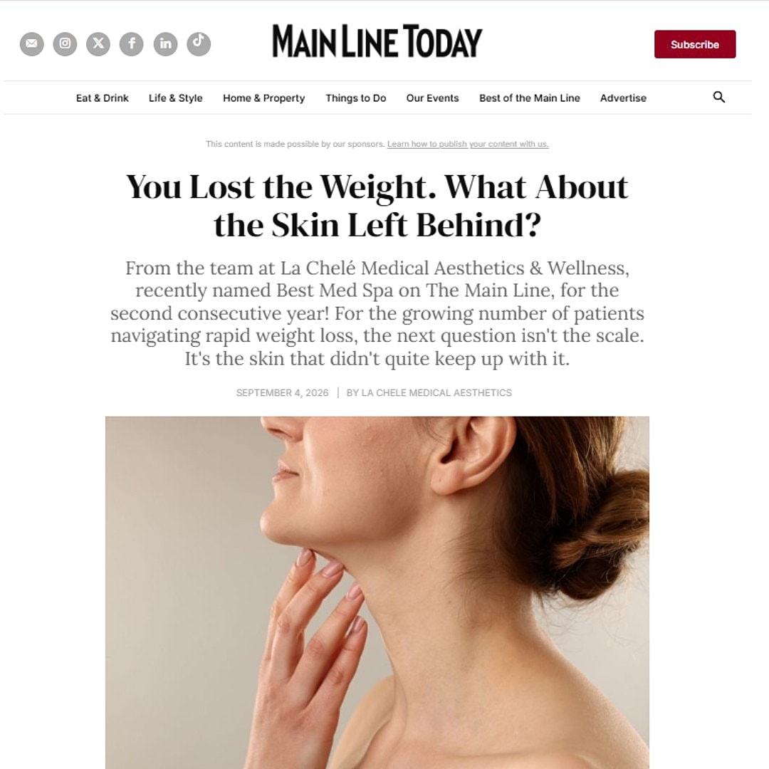 Woman assessing skin after weight loss.