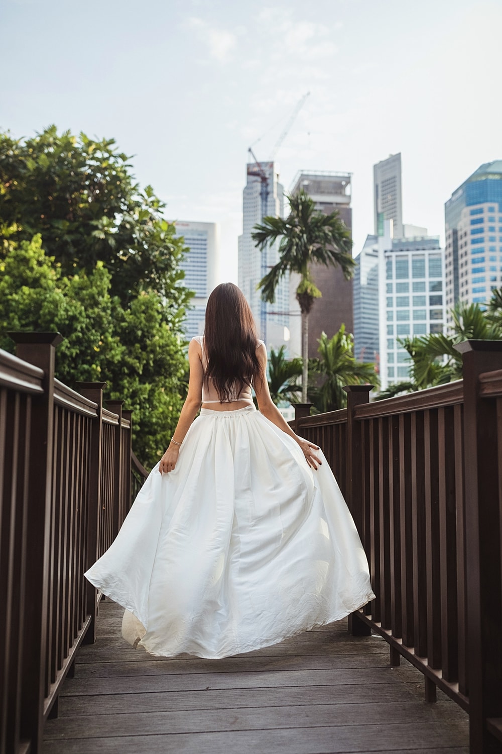Bride preparing for wedding with bouquet.