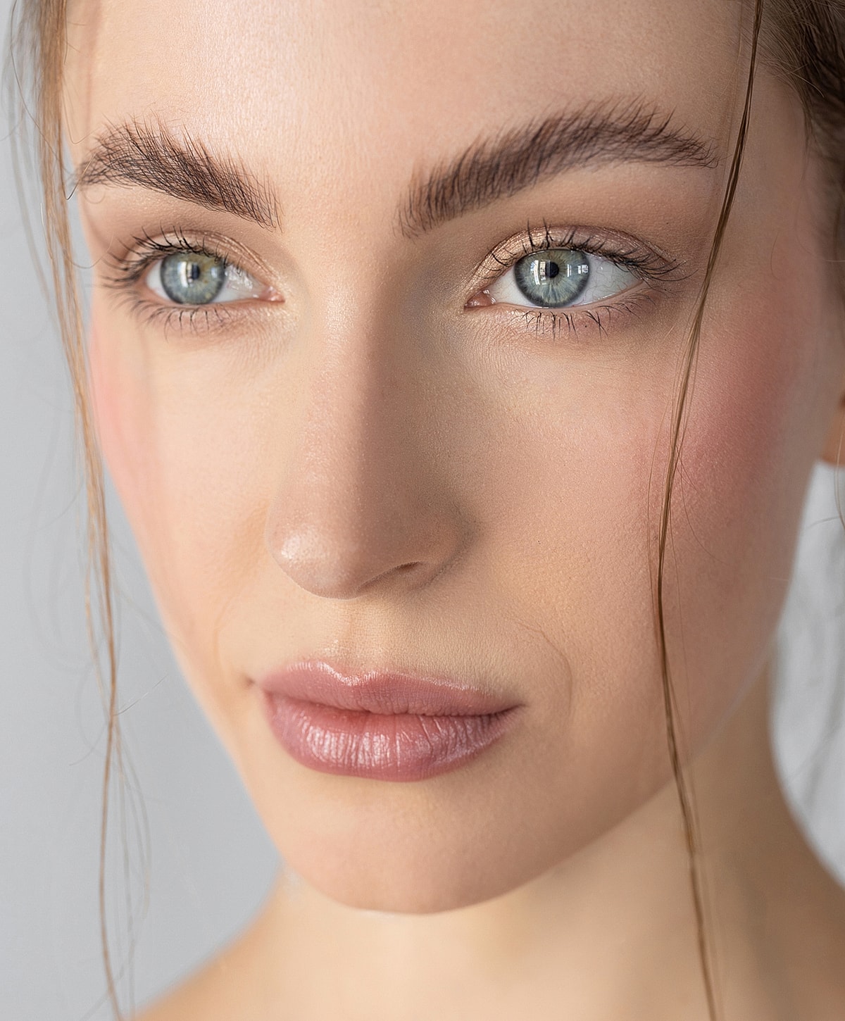 Close-up of a woman's face with natural beauty.