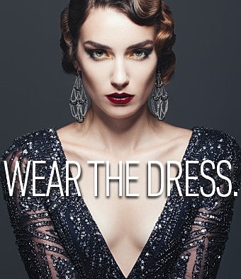 Elegant model in sparkling evening dress.