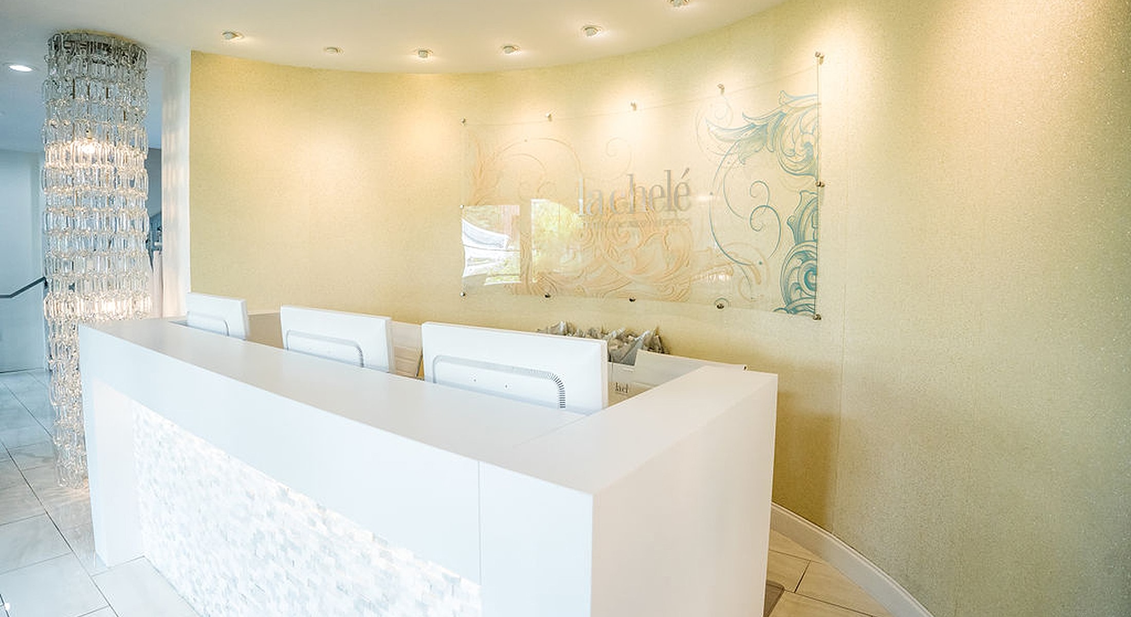 Modern reception area with decorative feature wall.