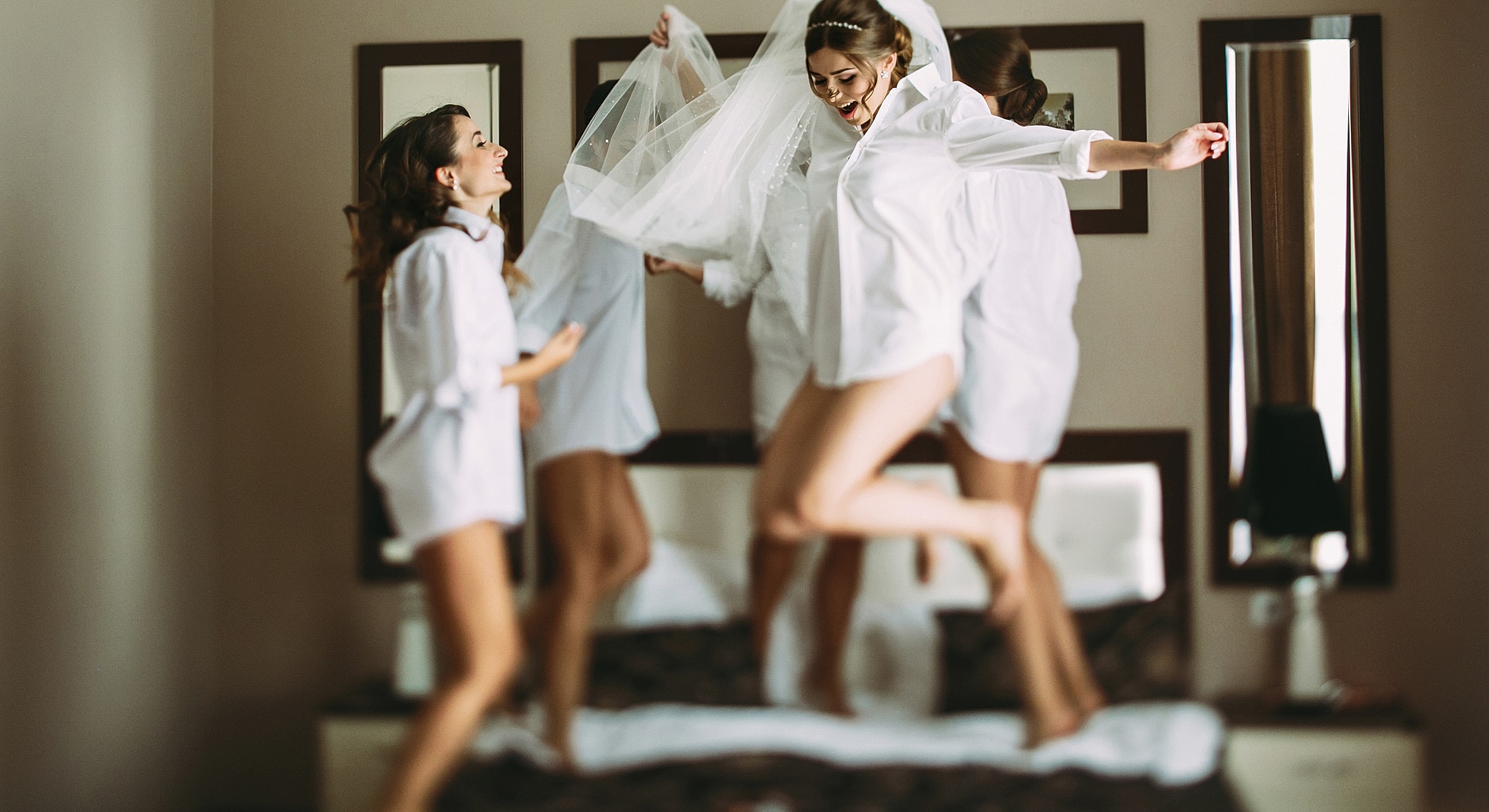 Bridesmaids celebrating before the wedding day.