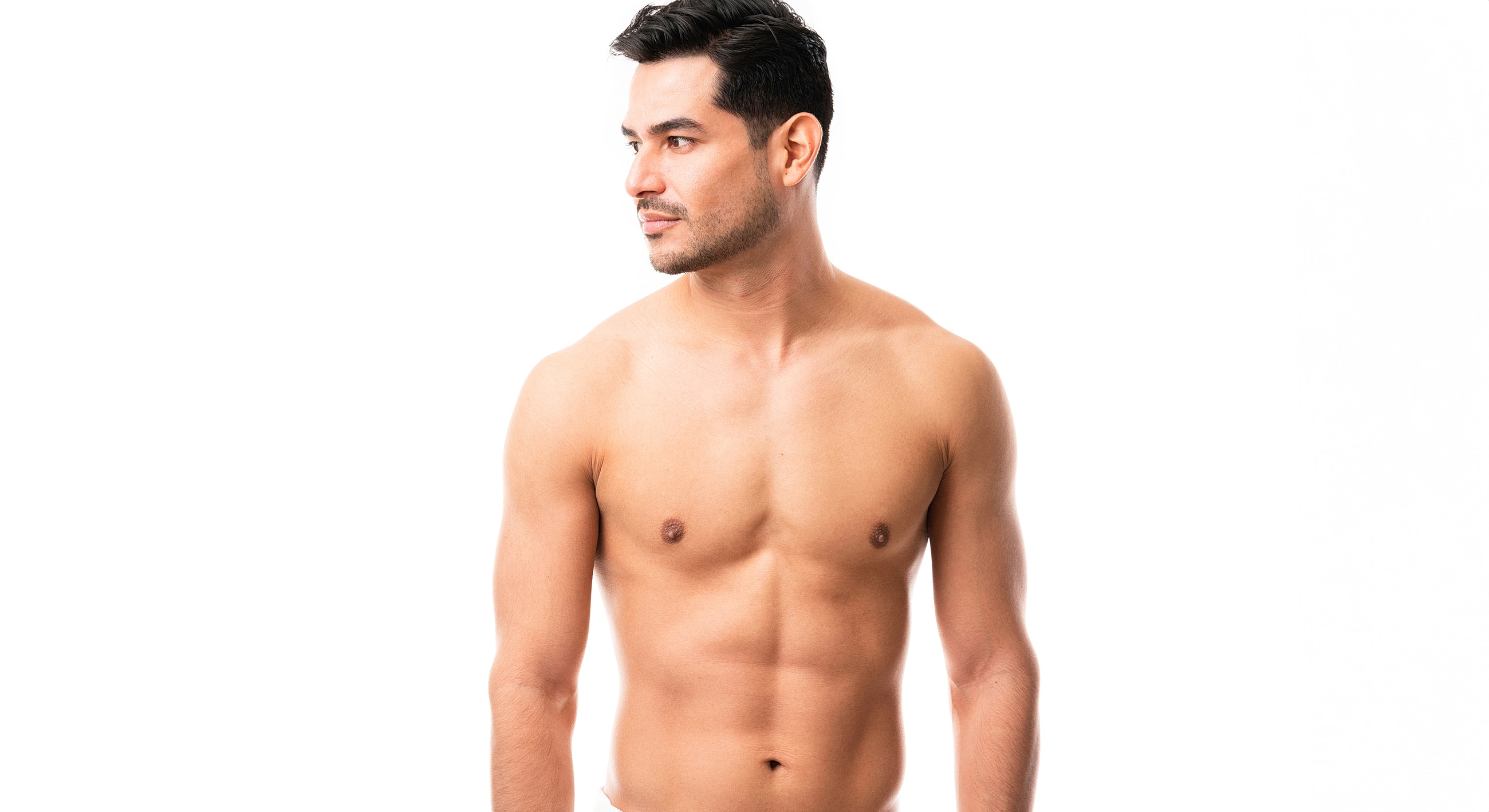 Bare-chested man posing against white background.